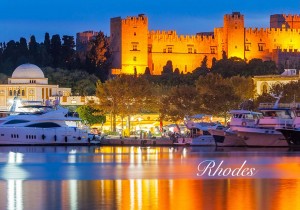A view of boats in the water and a castle.