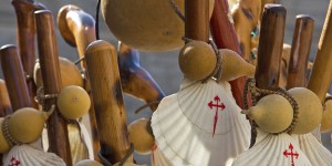 A close up of some wooden bells and a shell