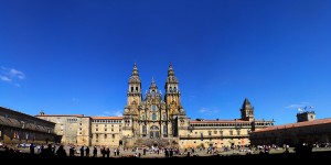 A large cathedral with many people in it