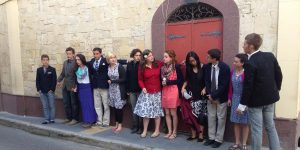 Chelsea Academy Senior Class standing next to each other in front of a doorway in Malta.