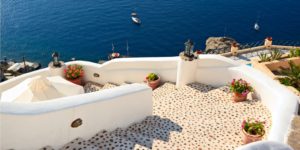 A view of the ocean from an outdoor patio.