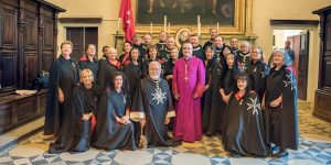 A group of people in robes and black capes.