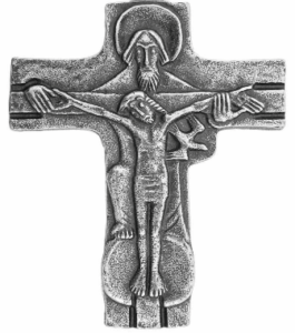 A cross with jesus on it and the crucifixion.