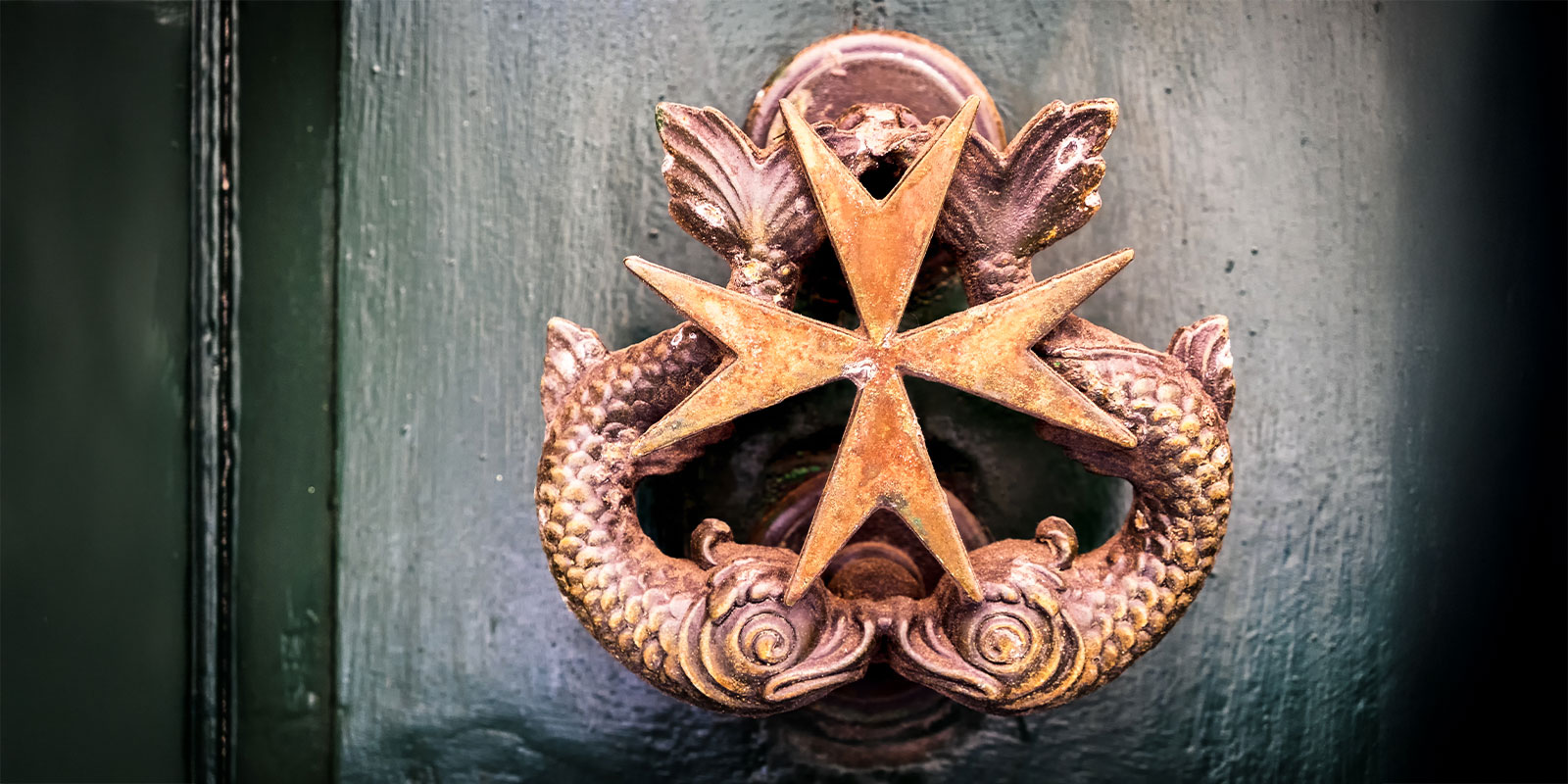 Maltese door knocker, enter into your own trip to Malta.