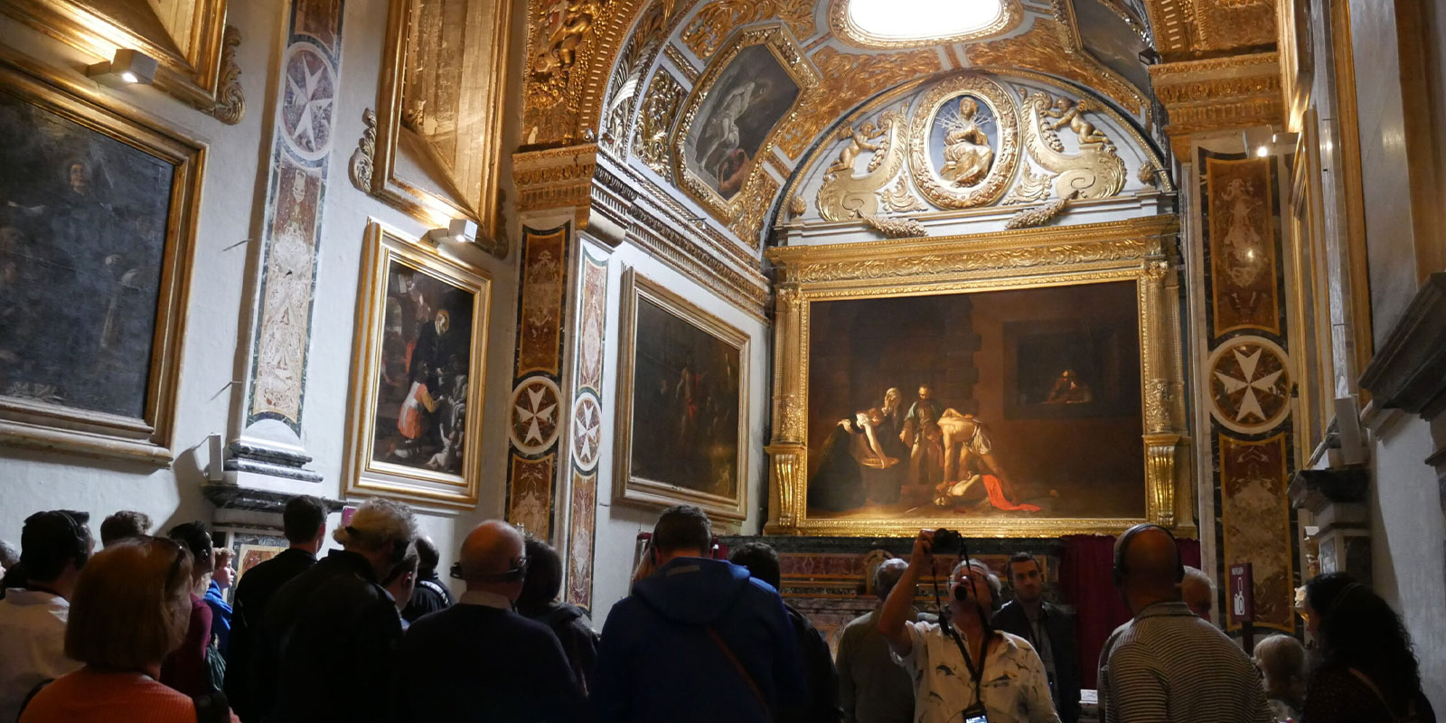 Students visit a gallery to enjoy the religious and period artwork.